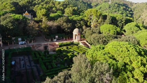 drone video of the romantic plant labyrinth in Barcelona flying high and and away evealing the whole labyrinth with his views photo