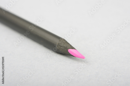 Pencil isolated on the gray background