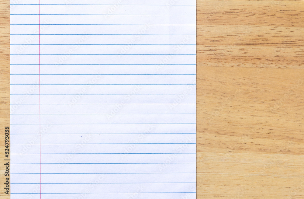 Notebook Lined Paper on wood desk Background Notebook Lined Paper on wood desk Background