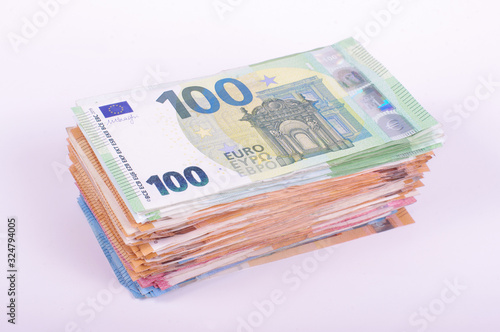 Pile of Euro banknotes isolated on the white background