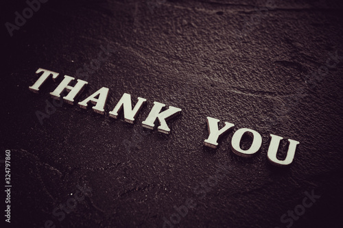 Thank you text on black background