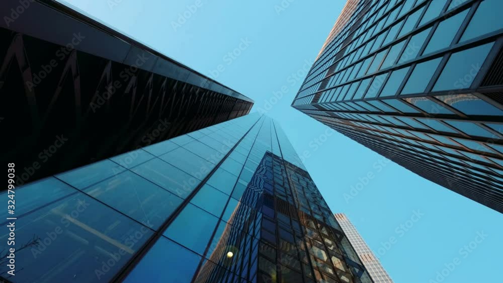 Bottom-up perspective of important and futuristic skyscrapers in the financial center of the City of London, England, UK Bottom-up perspective of important and futuristic skyscrapers in the financial center of the City of London, England, UK