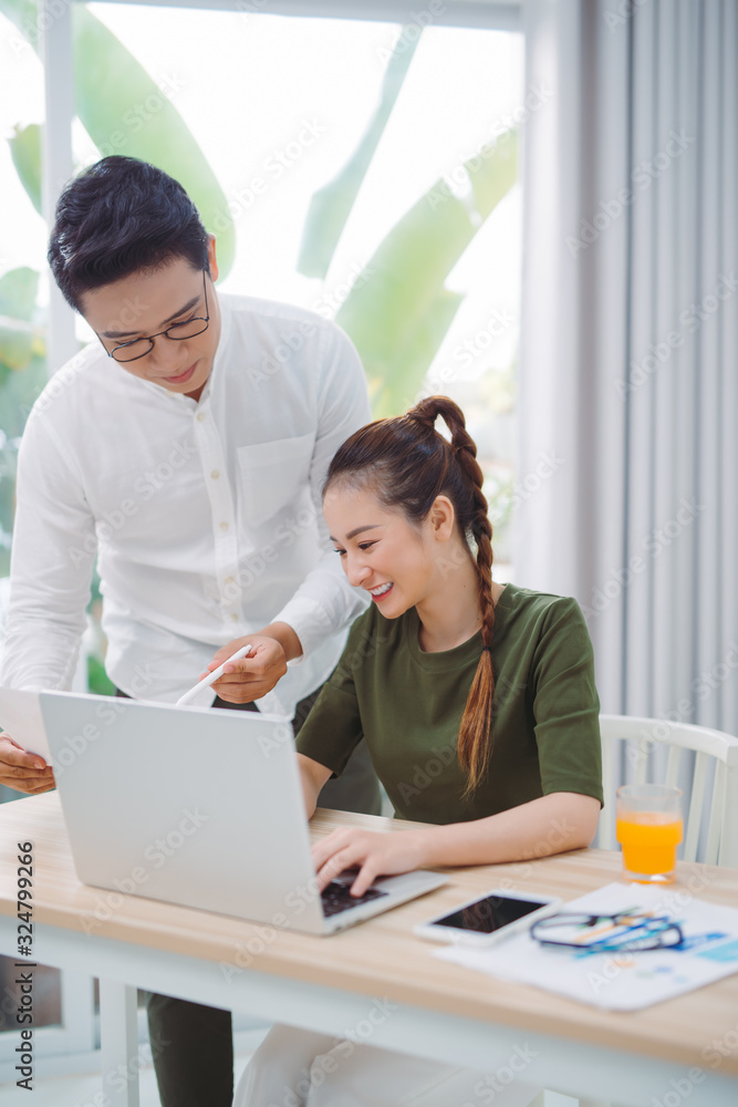 Happy family couple spending time together at home. Bright spacious apartment Happy family couple spending time together at home. Bright spacious apartment