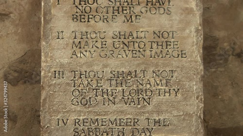 10 Commandments from the Bible which God tells Moses to write the Ten rules on Tablets of stone. Tilt shot - Stock Video Clip Footage