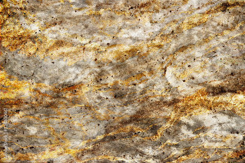 matt gray rough rock,stone surface, texture with dark brown,and