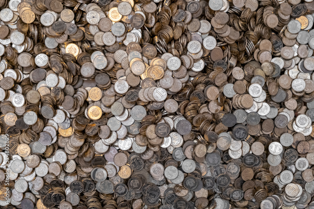A lot tenge coins background texture. Coins texture background. A lot tenge coins background texture. Coins texture background.