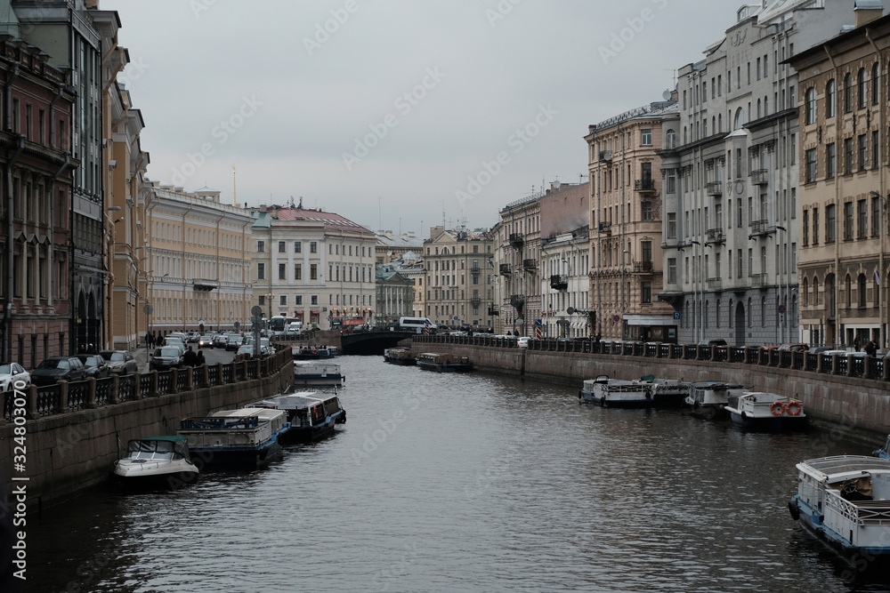 River channel with boats in Saint-Petersburg.
