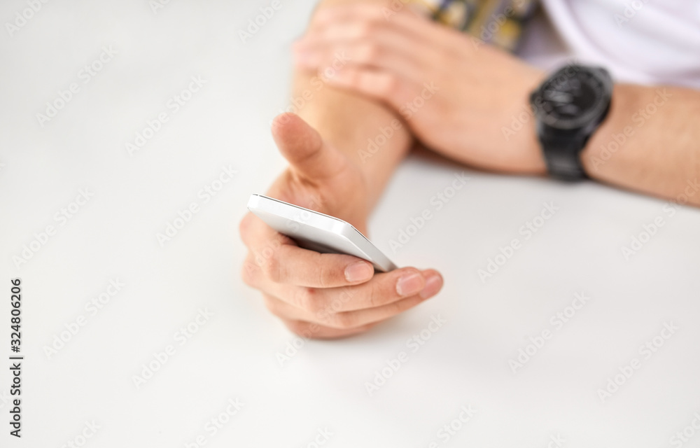 technology and people concept - close up of male hands with smartphone technology and people concept - close up of male hands with smartphone