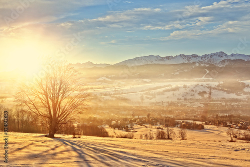 view of the rising suns and Polish mountains