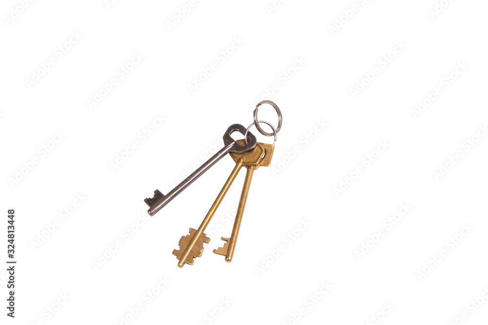A bunch of old keys on an isolated white background A bunch of old keys on an isolated white background