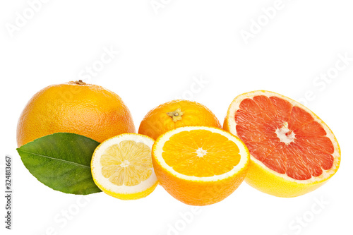 Isolated citrus fruits. Pieces of lemon  lime  pink grapefruit and orange isolated on white background  with clipping path