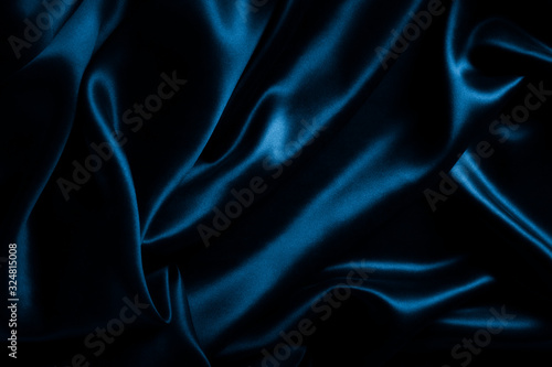 Satin blue silk background, close-up