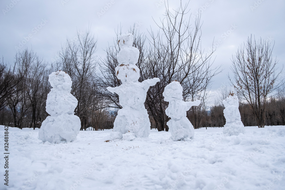 Snowman's family. Melting snowmen. Snowman's family. Melting snowmen.