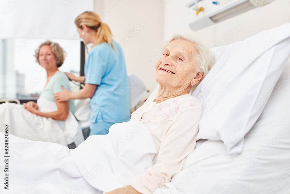 Senior in bedside at nursing home Senior in bedside at nursing home