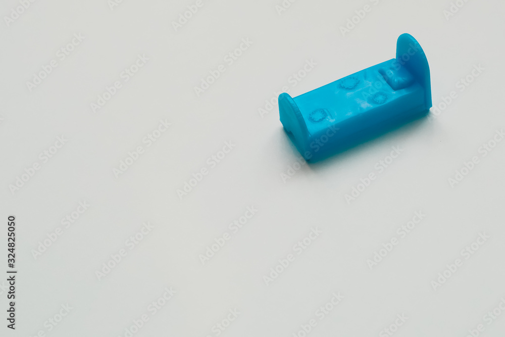 Fototapeta premium small toy bed on the background