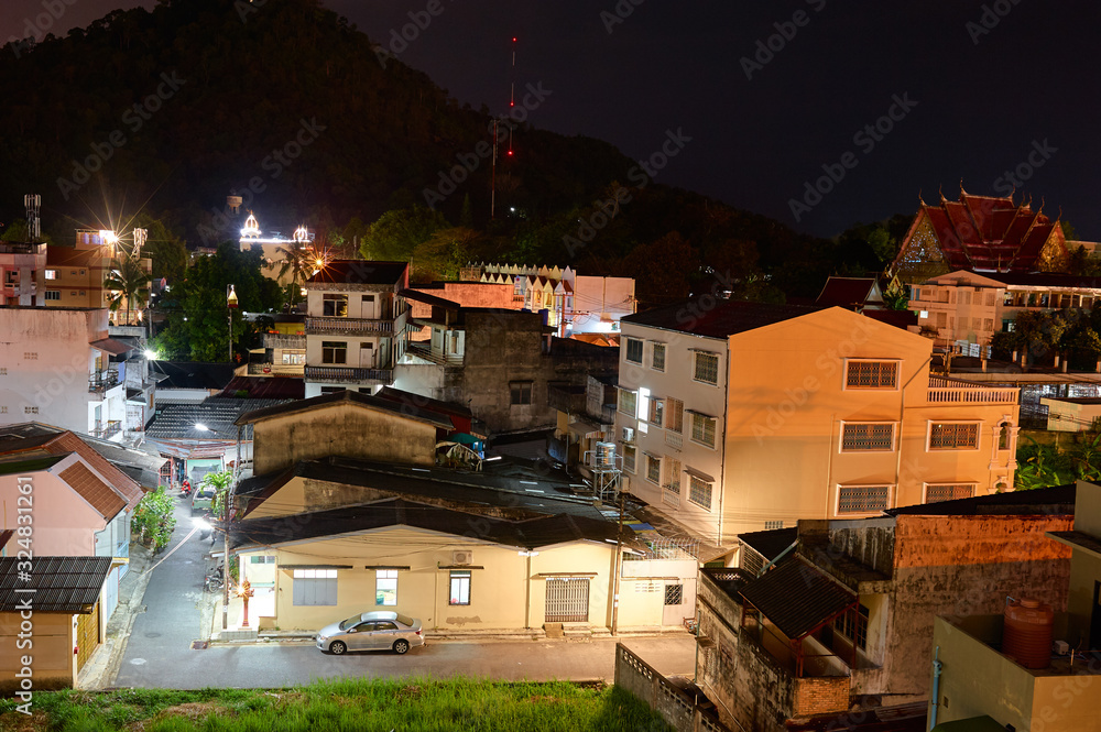Fototapeta premium View from the roof on Phuket town, Thailand. Lights of the city.