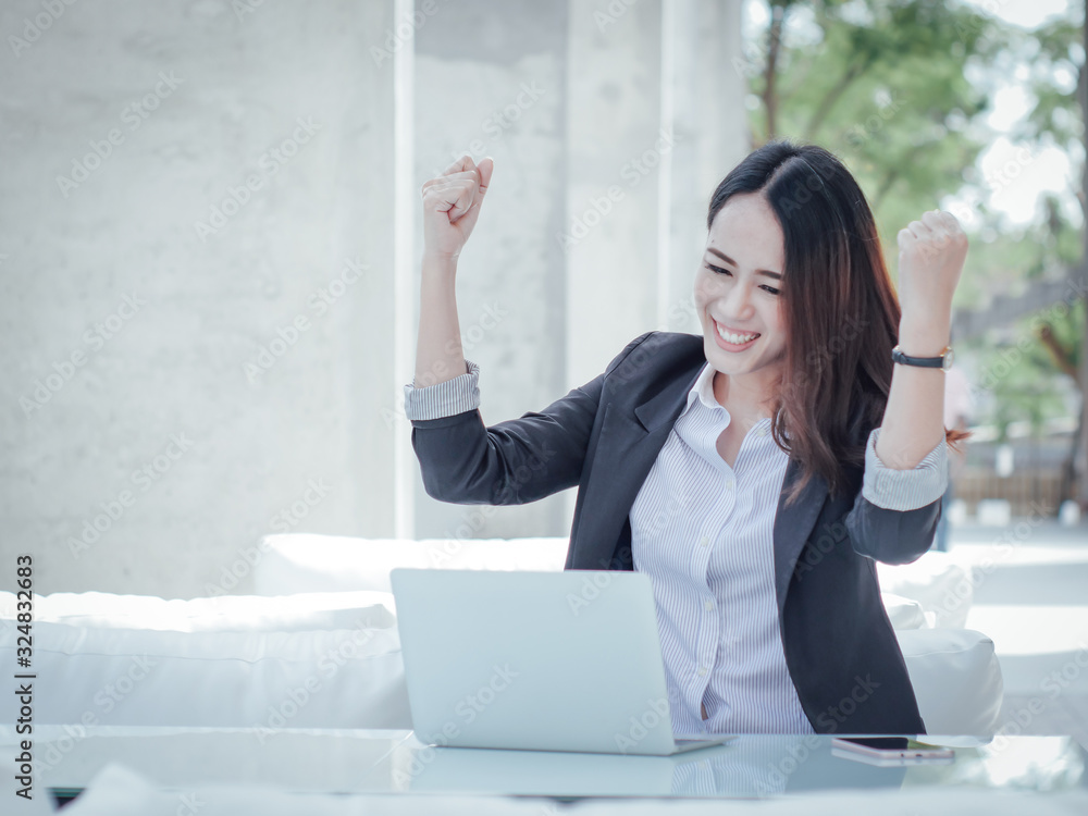 Asian business woman with laptop happy and smile concept success work Asian business woman with laptop happy and smile concept success work