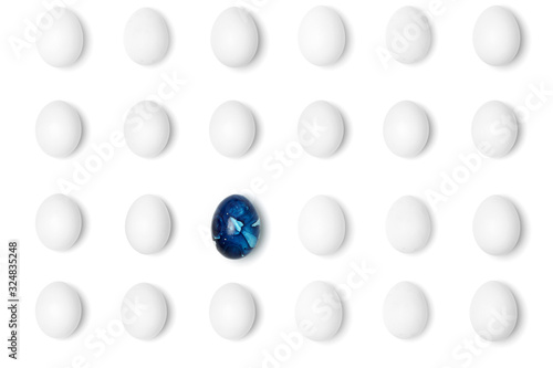 Fototapeta Blue egg and white eggs ester background