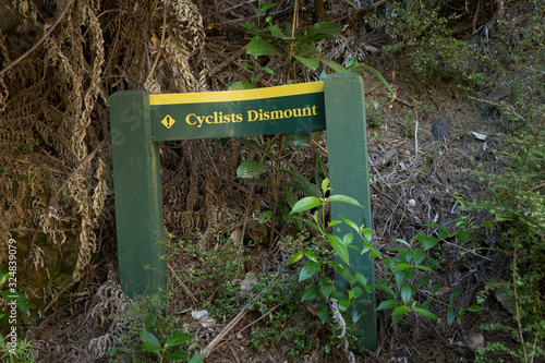 Karangahake gorge. Historic goldmining. Sign cyclists trail. New Zealand. photo