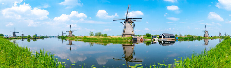 Fototapete Rotterdam Windmühlen Kinderdijk Spiegelung im Wasser  © momo11353