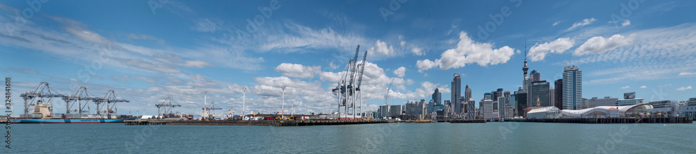 Skyline Auckland New Zealand. Boats and cranes panorama