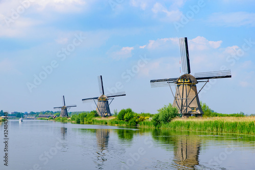 The windmills and the reflection on water in Kinderdijk, a UNESCO World Heritage site in Rotterdam, Netherlands