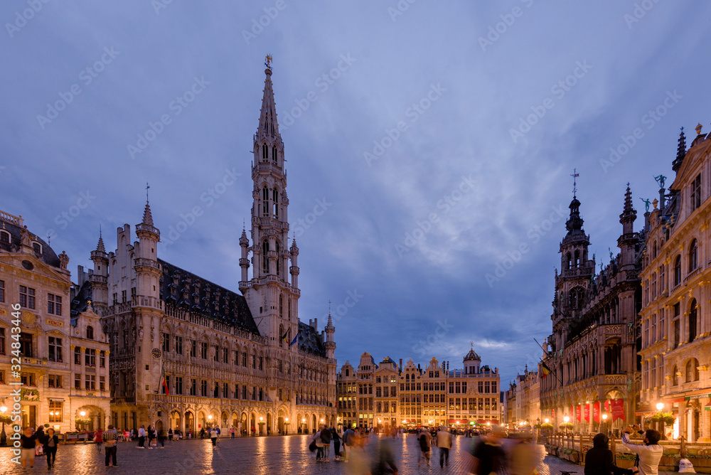 Grand Place and Town Hall panorama at night in Brussels Belgium.