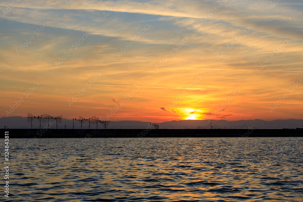Fototapeta premium winter sunset at sea in Thessaloniki