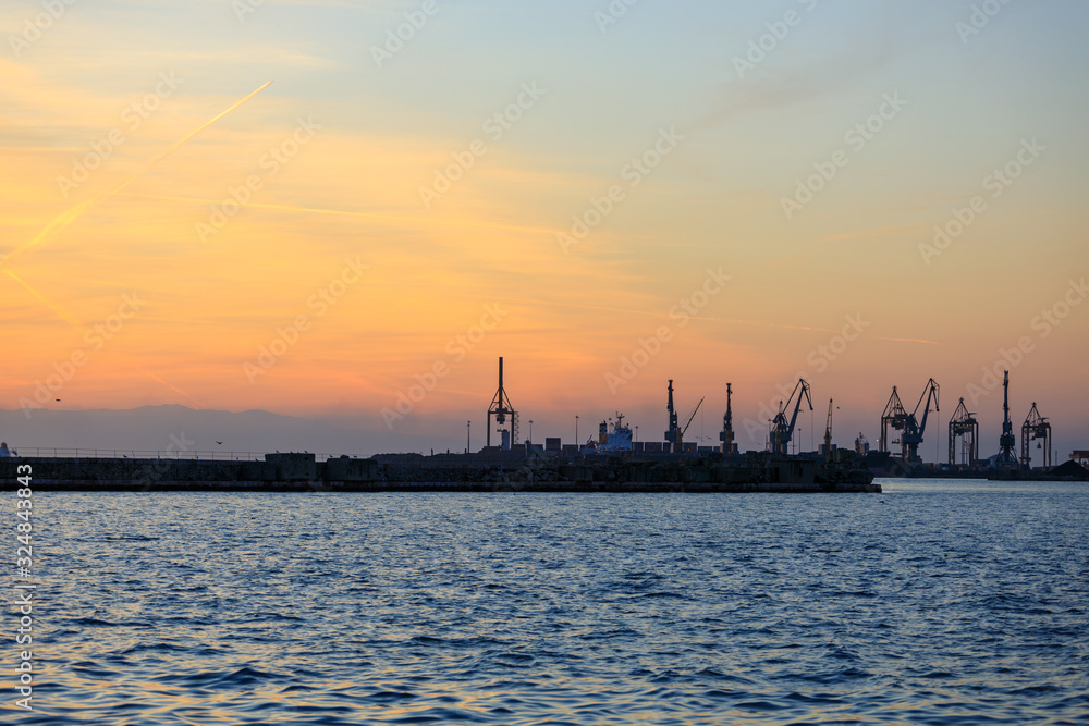 port at sea at sunset port at sea at sunset