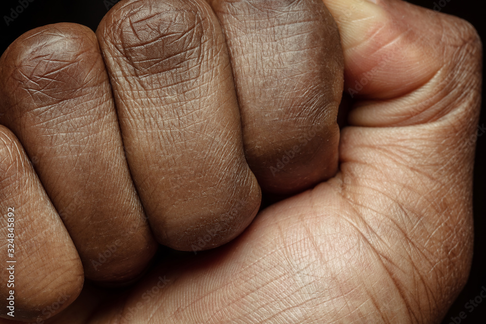 Fototapeta premium Hand. Detailed texture of human skin. Close up shot of young african-american male body. Skincare, bodycare, healthcare, hygiene and medicine concept. Looks beauty and well-kept. Dermatology.