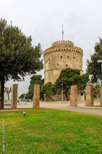 Thessaloniki, Greece - February 12 2020: White Tower, promenade in the afternoon