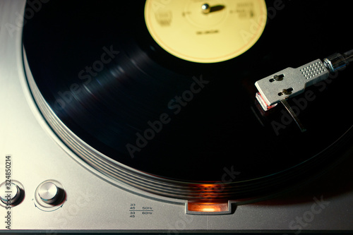 Turntable vinyl record player. Retro audio equipment for disc jockey. Sound technology for DJ to mix & play music.