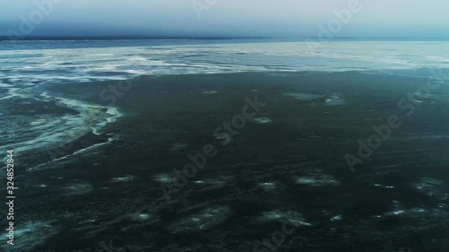 Spring dark ice drift seamlessly 30 seconds. Great background your project. 4K 3840x2160 UHD