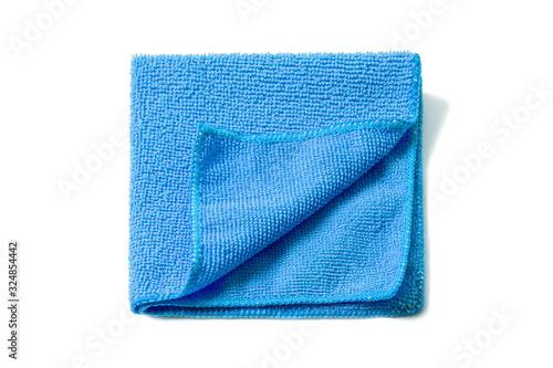 Blue universal microfiber cloth for cleaning objects and surfaces on a white background. Cleaning cloth, napkin. Four folded towel.