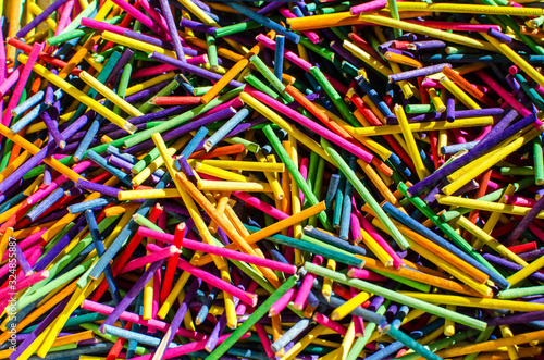 Background of colored sticks create an origami of cheerful and colorful colors. © rikstock