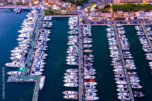 Aerial view, Puerto Portals luxury marina, Platja de s' Oratori beach and Illa d'en Sales, Portals Nous, Mallorca, Balearic Islands, Spain photo