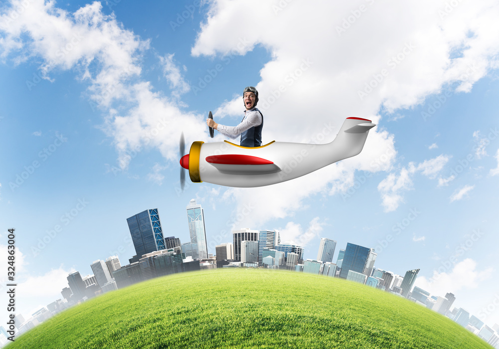 Screaming businessman in leather helmet flying Screaming businessman in leather helmet flying