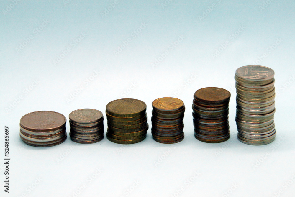 a series of several stacks of Russian rubles coins a series of several stacks of Russian rubles coins