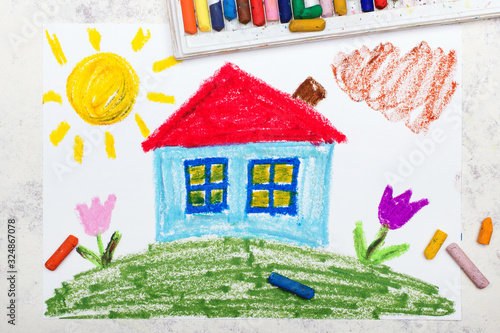 Colorful drawing: House with red roof on the hill. Idyllic landscape
