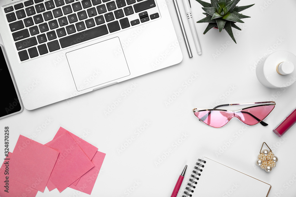 Devices, eyewear. Flat lay, mock-up. Feminine home office workspace, copyspace. Inspiring workplace for productivity. Concept of business, fashion, freelance, finance, artwork Trendy pastel colors Devices, eyewear. Flat lay, mock-up. Feminine home office workspace, copyspace. Inspiring workplace for productivity. Concept of business, fashion, freelance, finance, artwork Trendy pastel colors