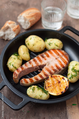 Grilled Wild Salmon Steak with Boiled Potatoes, Dill and Lemon
