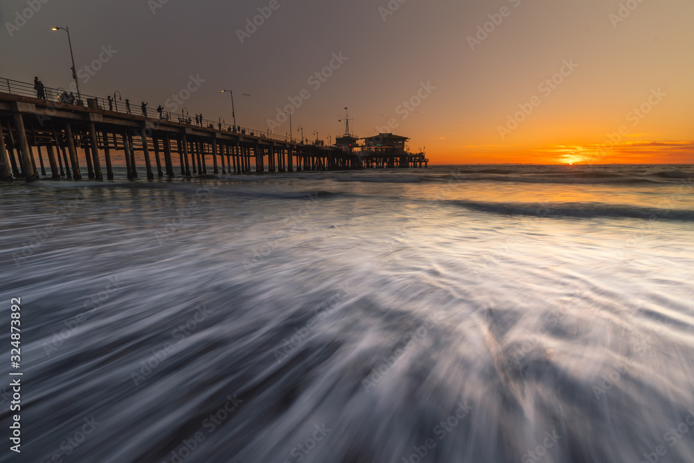 Santa Monica pier, iconical view from California coast, United States.