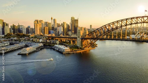 4k time lapse hyperlapse or drone lapse at Sydney city harbour during sunrise.  photo
