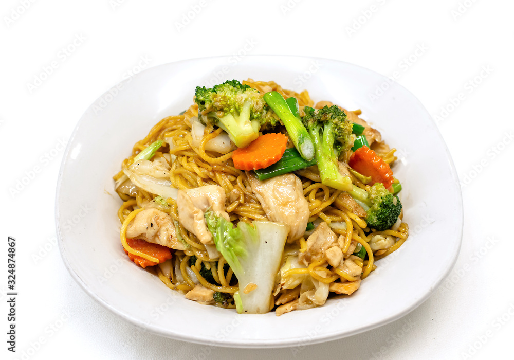 Lo mein is a Chinese dish with egg noodles. It often contains vegetables and some type of meat. On white background. Lo mein is a Chinese dish with egg noodles. It often contains vegetables and some type of meat. On white background.