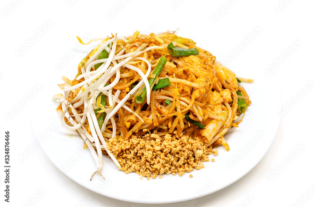 Dish of Pad thai on white background.Pad thai or phad thai, is a stir-fried rice noodle dish commonly served as a street food and at most restaurants in Thailand as part of the country's cuisine.