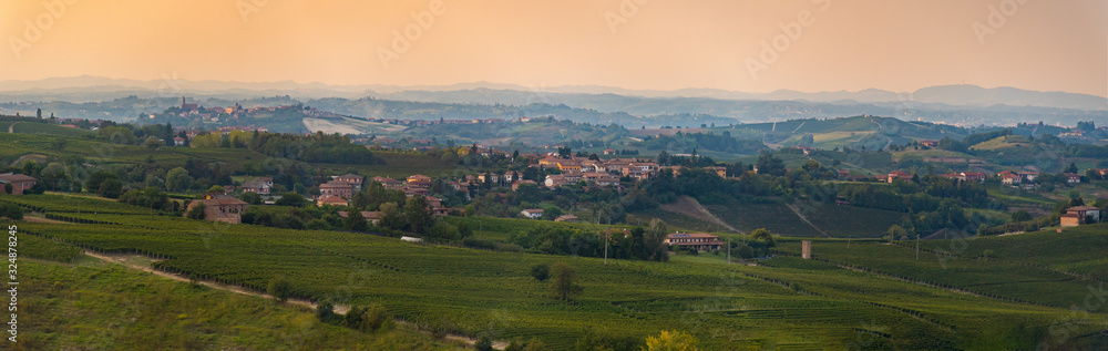 Langhe vineyards sunset panorama, of the most important wine area of Italy. Unesco Site, Piedmont, Northern Italy Europe.