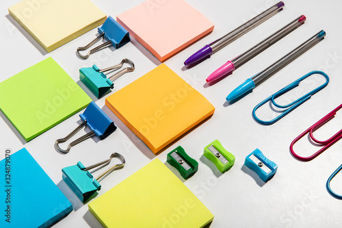 Knolling concept with sticky notes and accessories high view