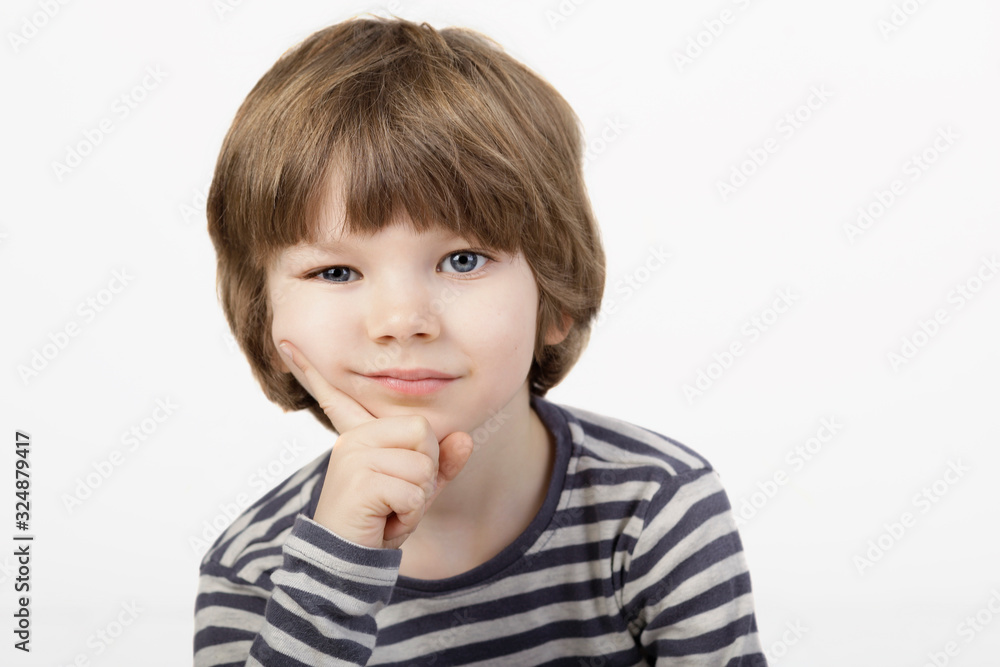 Little 5 year old thoughtfull boy, thinking face, contemplating serious problem Little 5 year old thoughtfull boy, thinking face, contemplating serious problem
