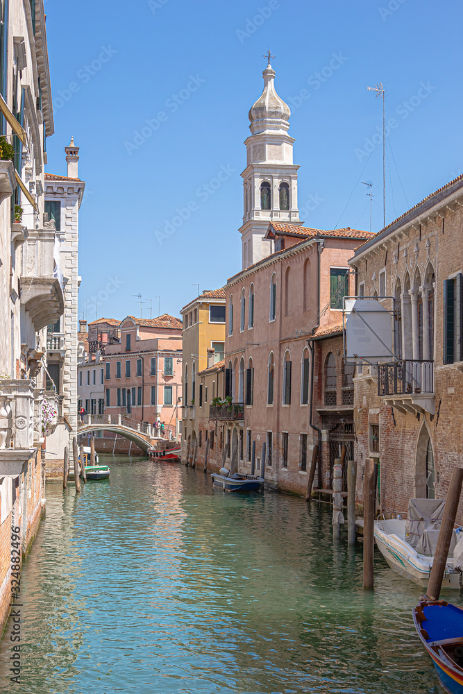 The narrow streets of Venice. Italy. Sunny day.
