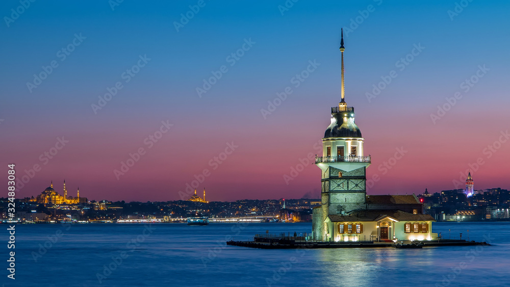 Maidens tower after beautiful sunset day to night timelapse in istanbul, turkey, kiz kulesi tower